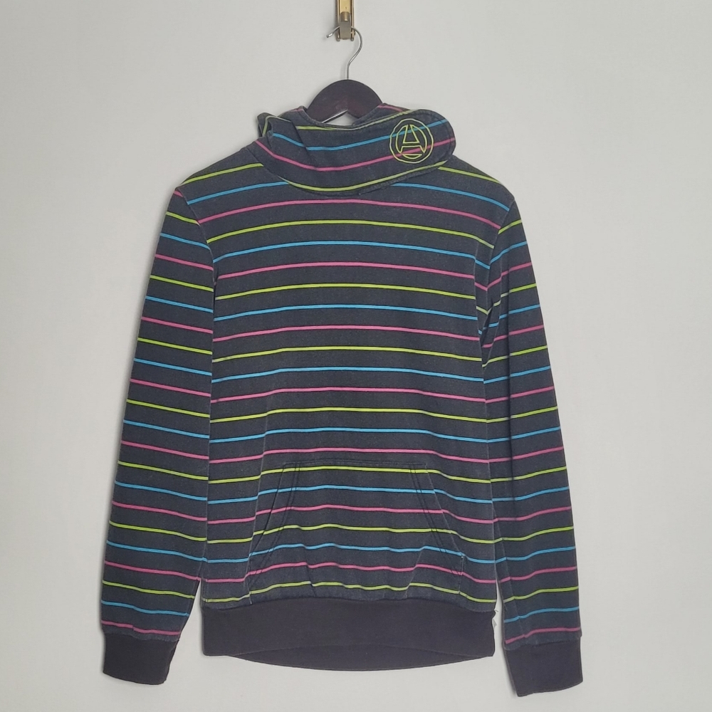 A black hoodie by Amnesia with blue, pink and green stripes